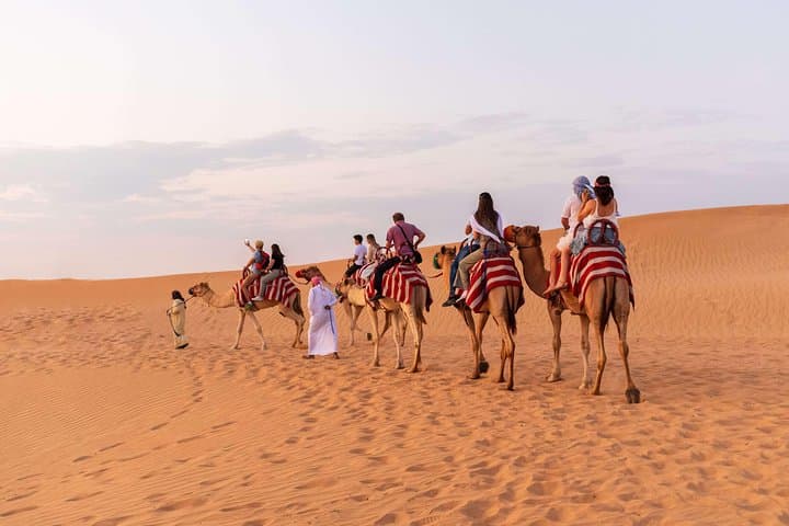 Evening Dubai Desert Safari: Dune Bashing, Camel Rides & BBQ Under Stars photo 2