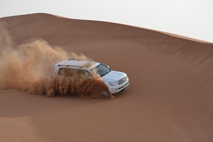 Morning Desert Safari Dubai: Private Dune Bashing, Camel Ride & Sandboarding photo 5