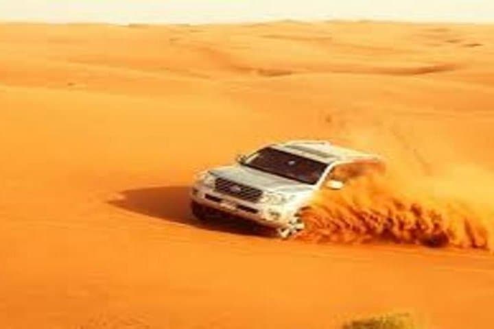 Red Dune Desert Safari Dubai: Sunset Dune Bashing, BBQ Camp & Belly Dance