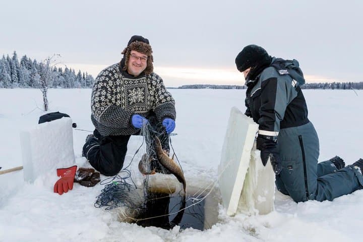 Ice Fishing by Snowmobile in Rovaniemi: Arctic Lake Adventure