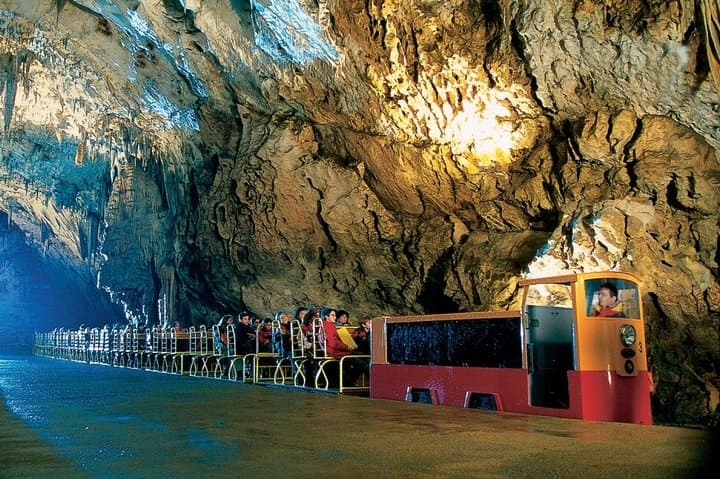 Postojna Cave & Predjama Castle Shore Excursion from Trieste — Electric Trains, Olms & a Cliffside Keep photo 2