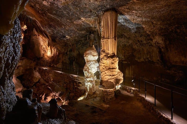 Postojna Cave & Predjama Castle Shore Excursion from Trieste — Electric Trains, Olms & a Cliffside Keep