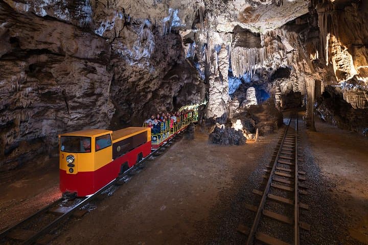 Postojna Cave & Predjama Castle Shore Excursion from Trieste — Electric Trains, Olms & a Cliffside Keep photo 5