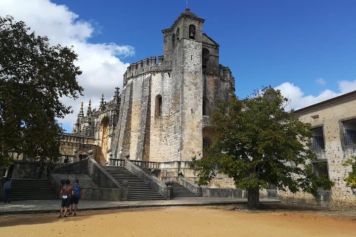 Porto to Lisbon Day Tour via Coimbra, Tomar & Almourol — Templar Route in One Day