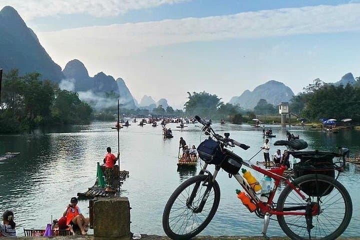 Yangshuo Full-Day Cycling, Yulong River Bamboo Raft & Impression Sanjie Liu photo 2
