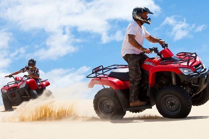 Abu Dhabi Desert ATV Adventure: Private Quad Biking Tours and Bedouin Camp Experience photo 1