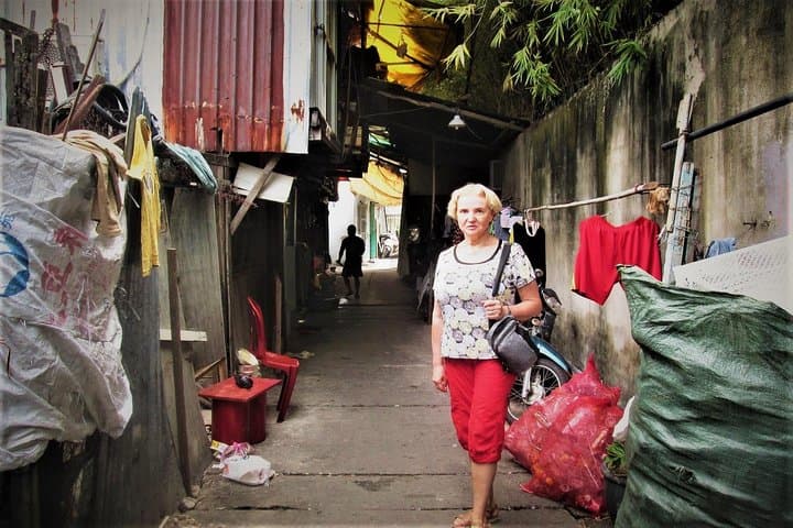 Scooter Through Saigon's Contrasts: Slum & Chillspots Tour with a Female Driver photo 6