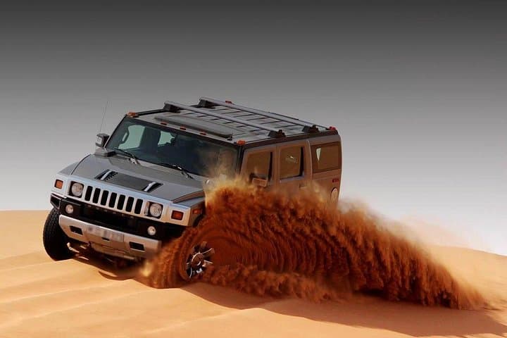 Private Hummer Desert Safari in Abu Dhabi: Dune-Bashing, Camel Rides & Sunset BBQ photo 1