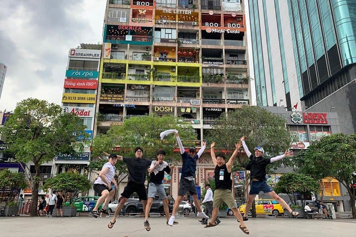 Scooter Through Saigon's Contrasts: Slum & Chillspots Tour with a Female Driver photo 3