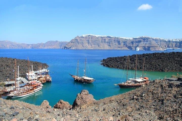 Santorini Volcano Tour: Boat to Nea Kameni & Hot Springs from Fira