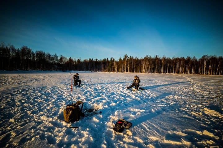 Ice Fishing by Snowmobile in Rovaniemi: Arctic Lake Adventure photo 3