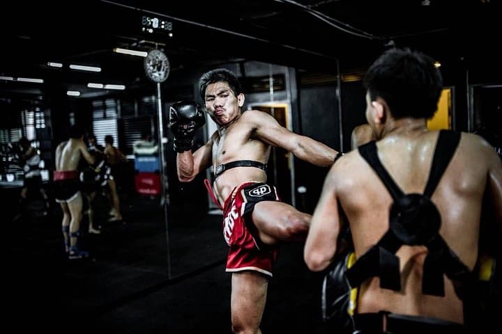 Train Like a Muay Thai Fighter in Bangkok — Gym Session & E‑San Dinner