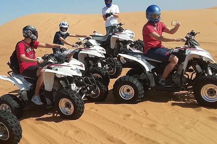 Evening Dubai Quad Bike Desert Safari: Self-Drive Dune Adventure & Desert Camp Experience photo 1