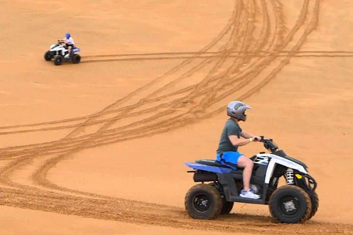 Evening Dubai Quad Bike Desert Safari: Self-Drive Dune Adventure & Desert Camp Experience photo 2