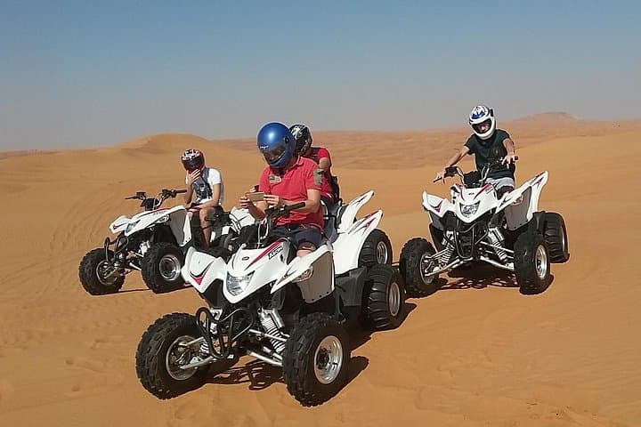 Evening Dubai Quad Bike Desert Safari: Self-Drive Dune Adventure & Desert Camp Experience photo 4