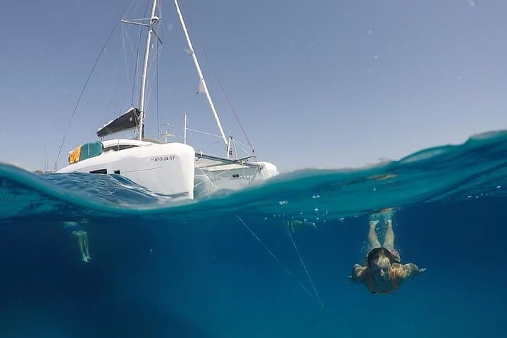 Sail and Snorkel in Ibiza: Full-Day Catamaran to Cala Codolar photo 2