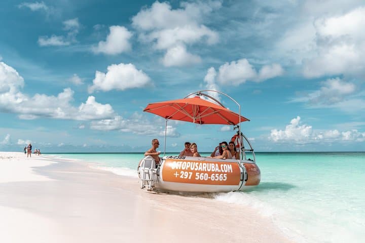 Aqua Donut Private Boat Aruba — Palm Beach Snorkel & Sunset Cruise