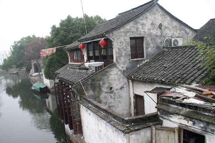 Suzhou Private Day Tour: Zhouzhuang Water Town & Panmen Garden Guide photo 4