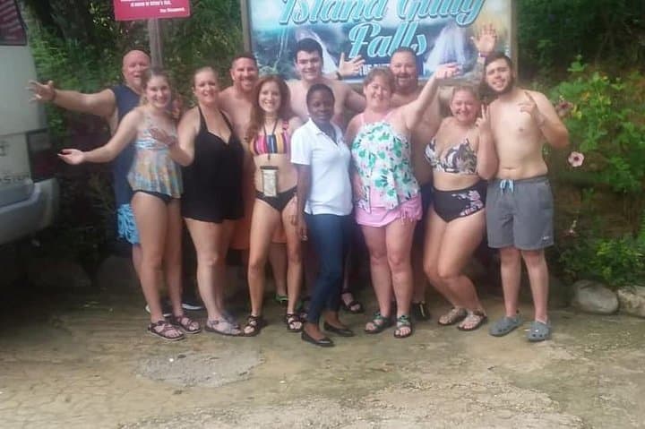 Blue Hole & Dunn's River Falls Tour: Tubing, Bamboo Rafting & Waterfall Climb from Montego Bay