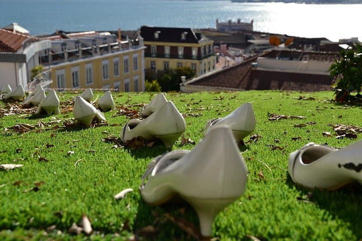 Lisbon Alfama & Baixa City Game — Miradouros, Street Art and Riddle Walk photo 3