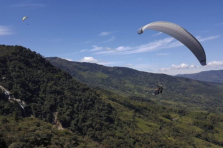 Medellín Adventure: Paragliding Over Waterfalls and Class IV Rafting in Cocorná photo 2