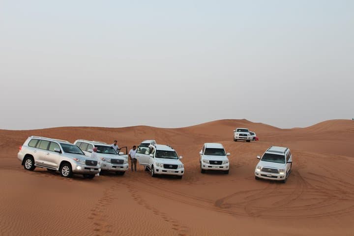 Dubai Evening Desert Safari with BBQ, Sandboarding & Live Entertainment