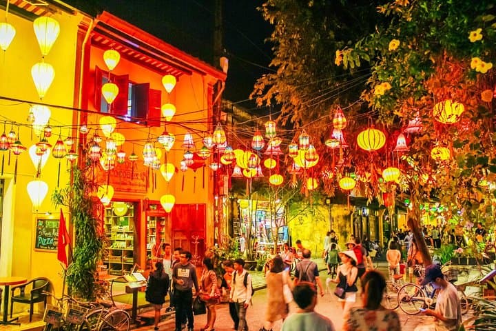 Hoi An Lantern Boat Tour: Old Town Walk, Japanese Bridge & River Lantern Release photo 3