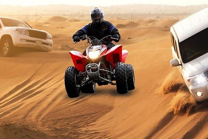 Dubai Desert Quad Bike Safari: Sunset Dunes, Dune Bashing & Bedouin Camp Experience photo 1