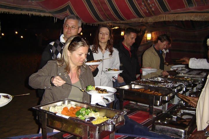 Dubai Private Desert Safari: Dune Bashing, Quad Bikes, Camel Ride & BBQ Dinner photo 5