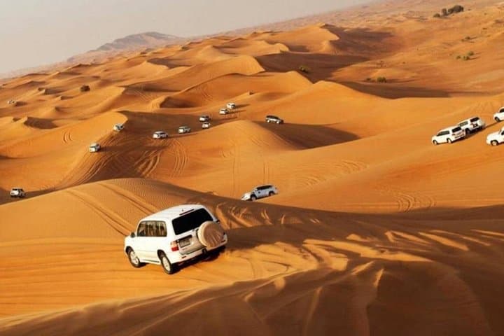 Dubai Evening Desert Safari: Dune Bashing, Camel Rides & BBQ Under the Stars photo 2