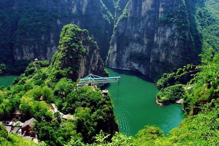 Day Trip to Longqing Gorge & Guyaju Caves: Cruise the Ravine and Explore Ancient Cliff Dwellings photo 5