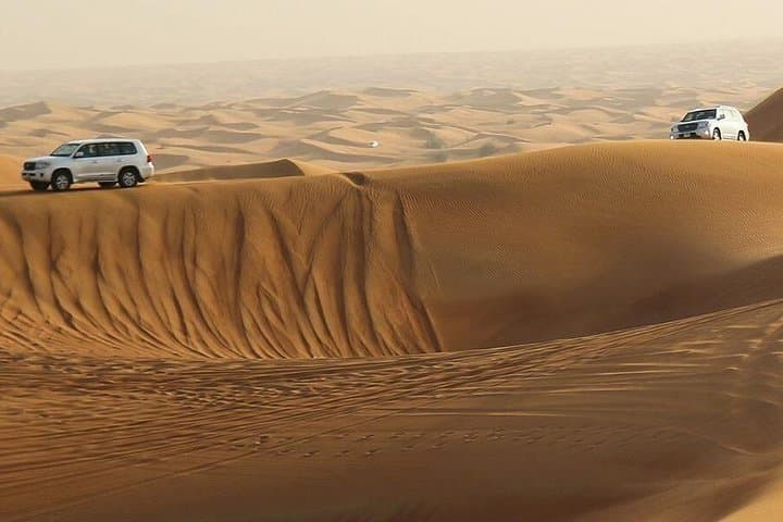 Evening Desert Safari in Abu Dhabi: Dune Bashing, Camel Rides & Bedouin Camp Experience photo 2