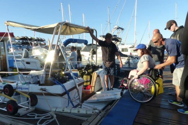 Accessible Eco Diving in Tenerife: Adapted Boat Baptism at Puerto Colón photo 3