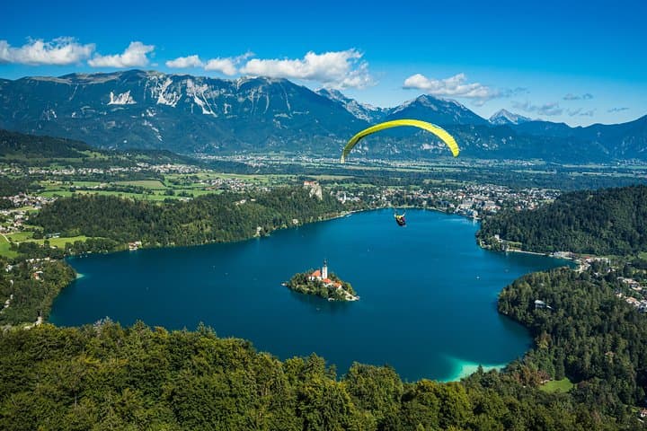 Soar Over Lake Bled: Tandem Paragliding with Castle and Island Views