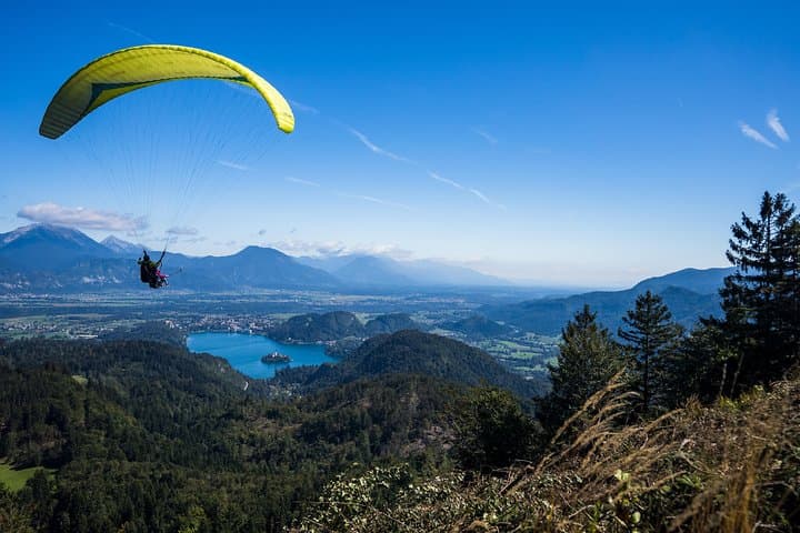Soar Over Lake Bled: Tandem Paragliding with Castle and Island Views photo 2