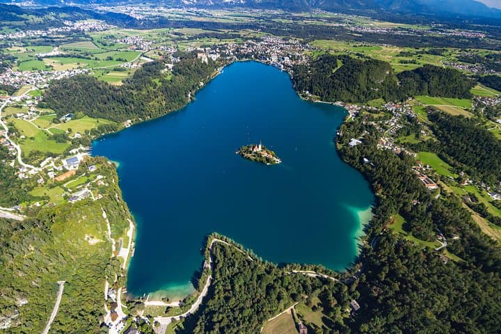 Soar Over Lake Bled: Tandem Paragliding with Castle and Island Views photo 3