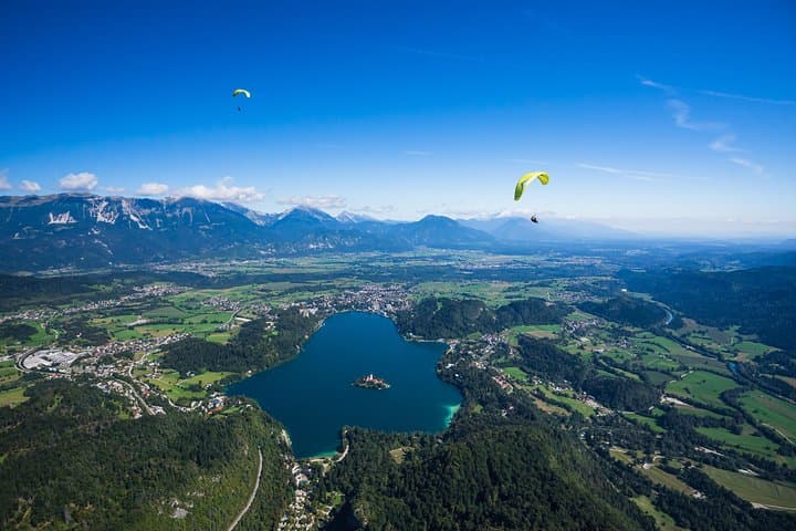 Soar Over Lake Bled: Tandem Paragliding with Castle and Island Views photo 4