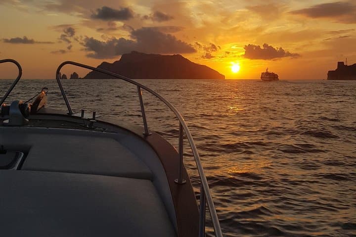 Capri Private Sunset Boat Tour — Faraglioni, Grottos & Aperitif