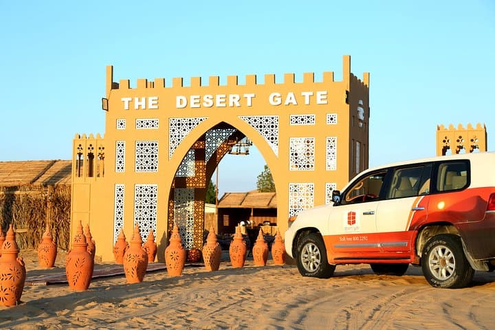 Abu Dhabi Afternoon Desert Safari & BBQ Dinner — Dune Bashing, Camel Rides and Sunset Camp