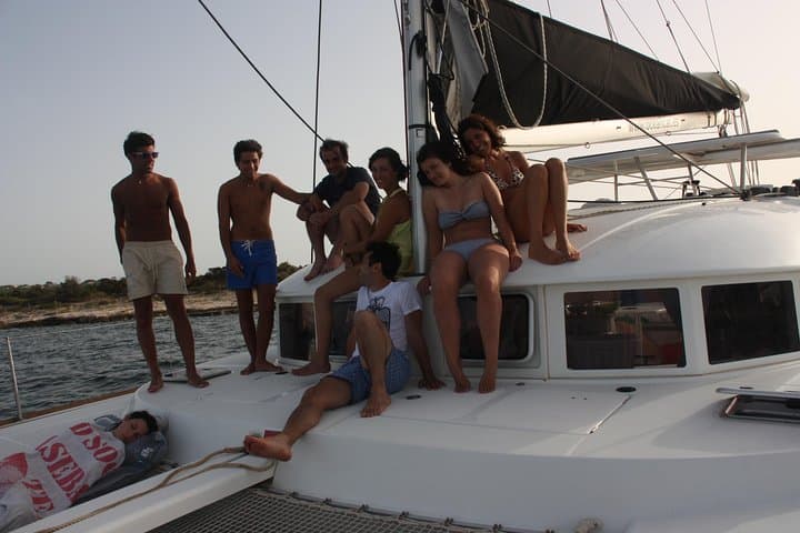 Private Catamaran to Playa Sa Roqueta — Full-Day Formentera Excursion from Es Pujols