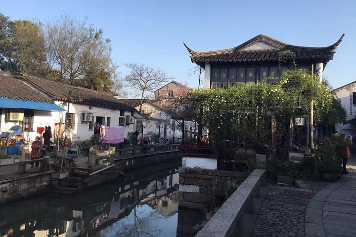 Private Suzhou Day Tour: Master-of-Nets Garden, Suzhou Museum & Tongli Cruise photo 5
