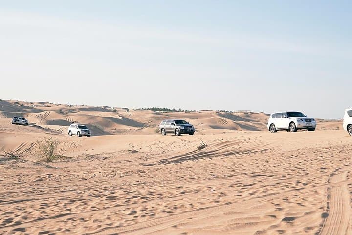 Sunrise Desert Safari Dubai: Camel Ride, Dune Bashing & Sandboarding photo 3