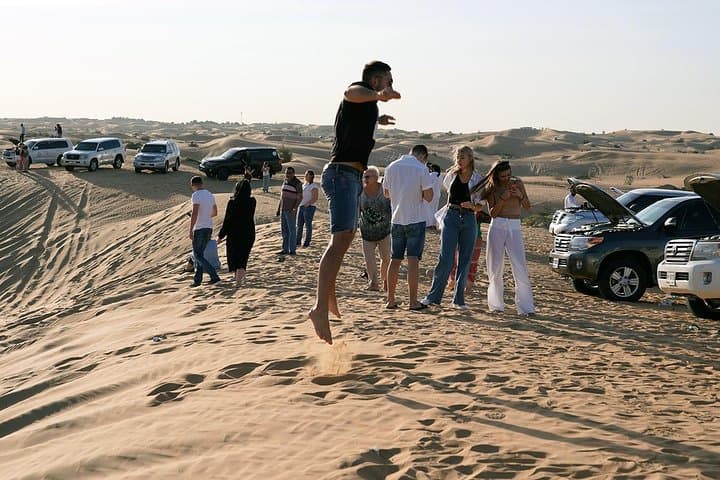 Sunrise Desert Safari Dubai: Camel Ride, Dune Bashing & Sandboarding photo 4