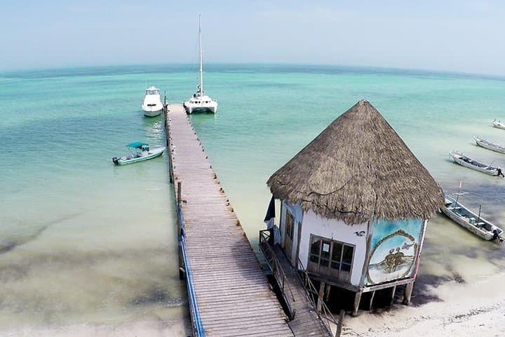 Holbox & Punta Mosquito Day Trip — Ferry, Bikes, Beaches & Lunch