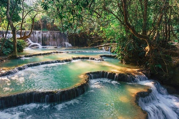 Pak Ou Caves and Kuang Si Falls Day Tour from Luang Prabang photo 3