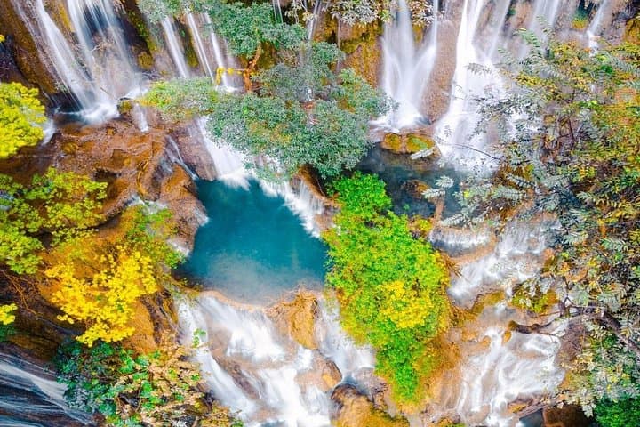 Pak Ou Caves and Kuang Si Falls Day Tour from Luang Prabang photo 4