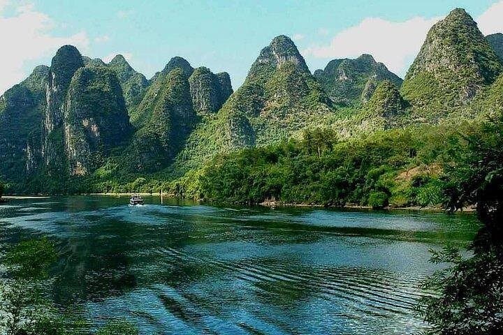 Yangshuo Li River Private Day Tour: Bamboo Rafting, Xianggong Hill Views & Countryside Cycling photo 3
