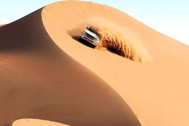 Evening Desert Safari in Dubai: Dune Bashing, BBQ & Live Shows photo 3