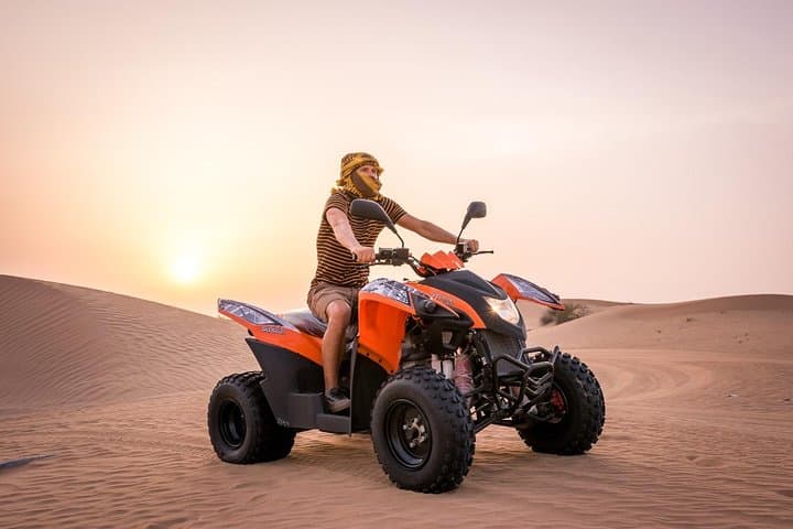 Dubai Morning Quad Bike Desert Tour — Private Dune Bashing, Sandboarding & Camel Ride