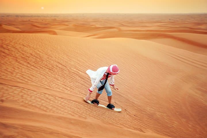 Evening Desert Safari in Abu Dhabi: Dune Bashing, Camel Ride & BBQ Experience photo 3